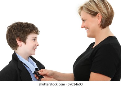 Mom Helping Adorable American 10 Year Old Boy Fix His Tie In Baggy Over Sized Suit Over White.