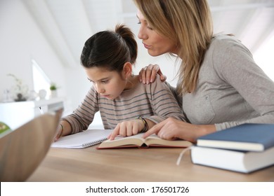 Mom Helping Kid With Homework