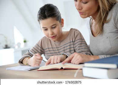 Mom Helping Kid With Homework