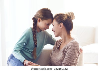 Mom With Her Pre Teen Daughter Hugging, Positive Feelings, Good Relations.