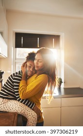 Mom Hugging Child At Home, Black Family