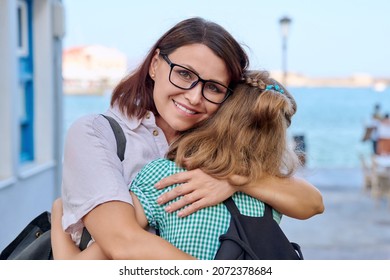 Mom Hugging Daughter Outdoors, Happy Mother's Face Close Up