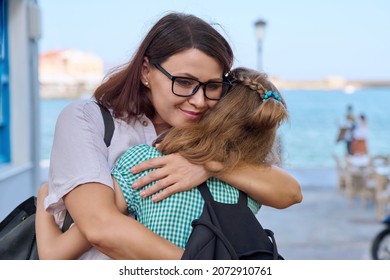 Mom Hugging Daughter Outdoors, Happy Mother's Face Close Up