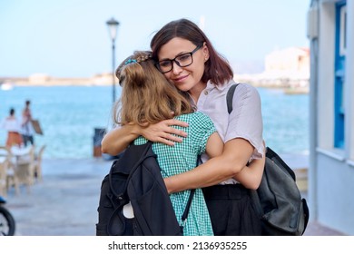 Mom Hugging Daughter Outdoors, Happy Mother's Face Close Up