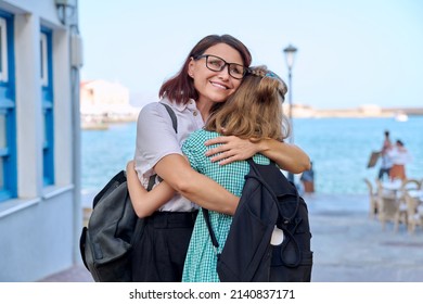 Mom Hugging Daughter Outdoors, Happy Mother's Face Close Up