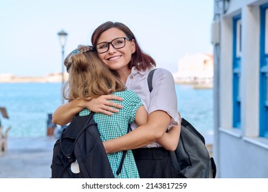 Mom Hugging Daughter Outdoors, Happy Mother's Face Close Up