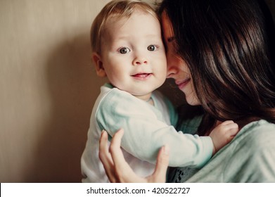 Mom Hugs Baby