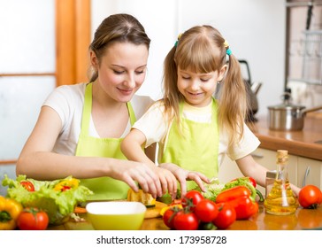 Mom And Kid Girl Preparing Healthy Food