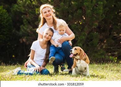 Mom With Kids On A Walk