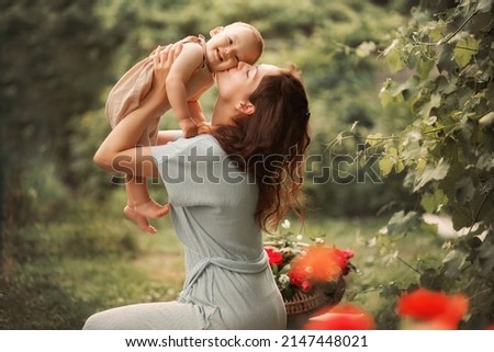 Similar – Image, Stock Photo Young mother with her cute infant baby boy child sitting on bench in city park