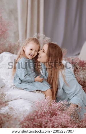 Similar – Image, Stock Photo happy mother and 9 month old baby in matching pajamas