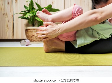 Mom And Little Daughter Spend Time Together For Yoga In Quarantine At Home. National Yoga Day. Healthy Living In Lockdown.