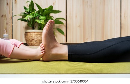 Mom And Little Daughter Spend Time Together For Yoga In Quarantine At Home. National Yoga Day. Healthy Living In Lockdown.