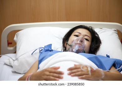 Mom In Mask Oxygen After Childbirth