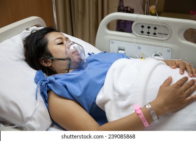 Mom In Mask Oxygen After Childbirth