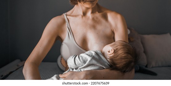 Mom, Mummy, Young Mother With Little Baby Daughter. Breast-feeding. Mum Feeding Child With Breast Milk.Newborn Cute Happy Girl Smiling In Woman Hands.Family Happiness.Age Parents,parenting,motherhood.