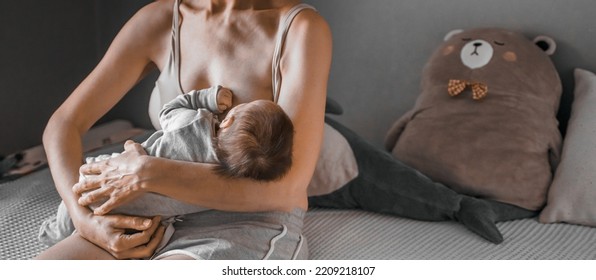 Mom, Mummy, Young Mother With Little Baby Daughter. Breast-feeding. Mum Feeding Child With Breast Milk.Newborn Cute Happy Girl Smiling In Woman Hands.Family Happiness.Age Parents,parenting,motherhood.