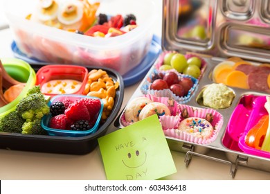 Mom Packs A Happy Note Of Encouragement With A Colorful Bento Box Lunch Packed With Healthy Fruits, Veggies And Snacks