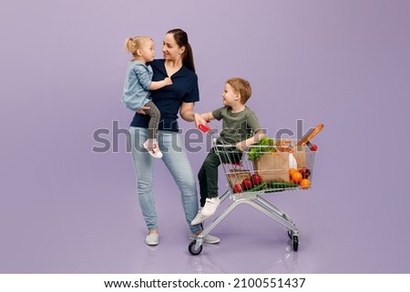 Similar – Image, Stock Photo Mother pushing shopping cart with her infant baby boy child down department aisle in supermarket grocery store. Shopping with kids concept.