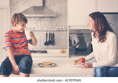 Mom And Son Eating Togetherness Cheerful Concept