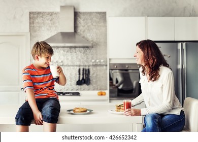 Mom And Son Eating Togetherness Cheerful Concept