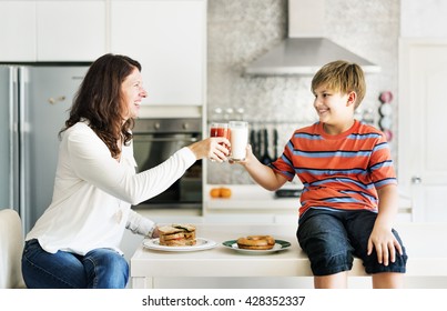 Mom And Son Eating Togetherness Cheerful Concept