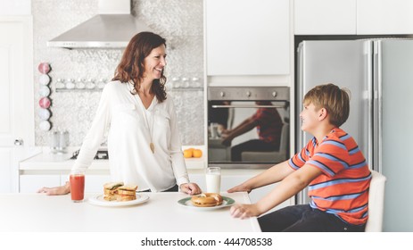 Mom And Son Eating Togetherness Cheerful Concept