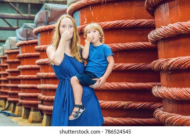 Mom And Son Travelers Shows How Stinks Fish Sauce On Phu Quoc, Vietnam.