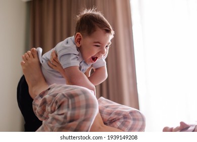 mom of special child plays with him. family with child cerebral palsy lives a normal life. Small moments of happiness real life. Disabled kid toddler laughs smiles. Love caring support.  Lifestyle
