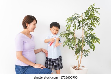 Mom Spray To Her Child