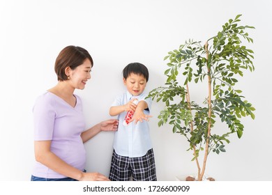 Mom Spray To Her Child