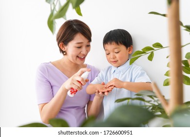 Mom Spray To Her Child