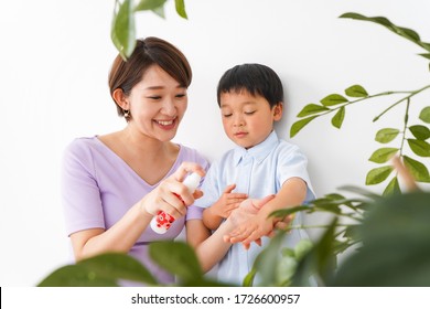 Mom Spray To Her Child