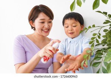 Mom Spray To Her Child