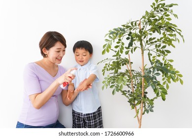 Mom Spray To Her Child