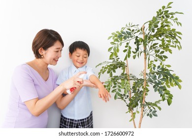 Mom Spray To Her Child