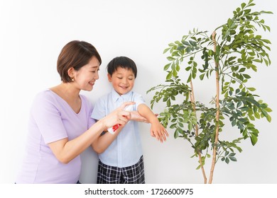 Mom Spray To Her Child