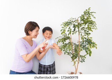 Mom Spray To Her Child