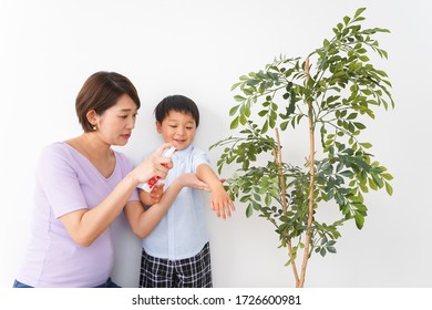 Mom Spray To Her Child