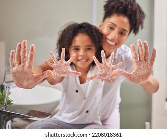 A Mom Teaching Child To Clean Their Hands, Using Soap And Water In The Bathroom To Destroy Germs To Stay Healthy. Kid Washing Dirty Hand, Keeps Family Health Safe And Prevent Dangerous Bacteria