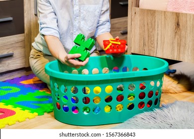 Mom Tidy Up Child Scattered Toys In Messy Room