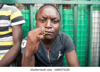 Mombasa / Kenya - December 5, 2019: Black Man Frowns While Chewing Betel Nuts On The Streets Of Mombasa