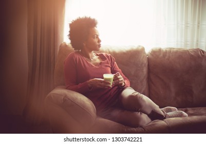 Moment For Relax. African American Woman Drinking Coffee At Home. 