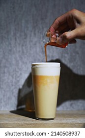 The Moment The Syrup Is Poured Into The Frothy Drink