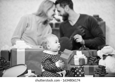 Moments Of Joy. Valentines Day. Red Boxes. Shopping. Boxing Day. Love And Trust In Family. Bearded Man And Woman With Little Girl. Father, Mother And Doughter Child. Happy Family With Present Box.