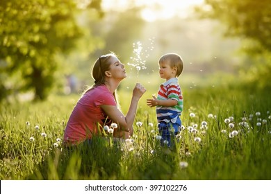 With mommy and dandelions