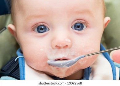 Mommy Feeding Baby Warm Cereal