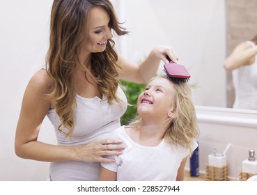 Mommy, you are the best hairdresser! - Powered by Shutterstock