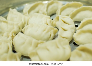 Momo , Type Of South Asian Dumpling; Native To Tibet, Nepal, Bhutan And Sikkim. It Is Similar To Chinese Baozi And Jiaozi, Mongolian Buuz, Japanese Gyoza And Korean Mandu. Stock Photograph.