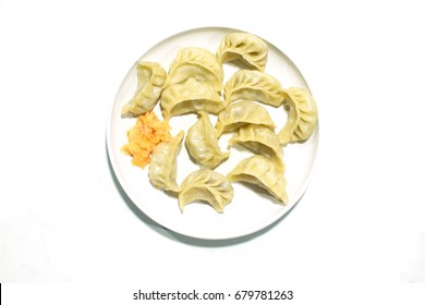 Momo , Type Of South Asian Dumpling; Native To Tibet, Nepal, Bhutan And Sikkim. It Is Similar To Chinese Baozi And Jiaozi, Mongolian Buuz, Japanese Gyoza And Korean Mandu. Stock Photograph.